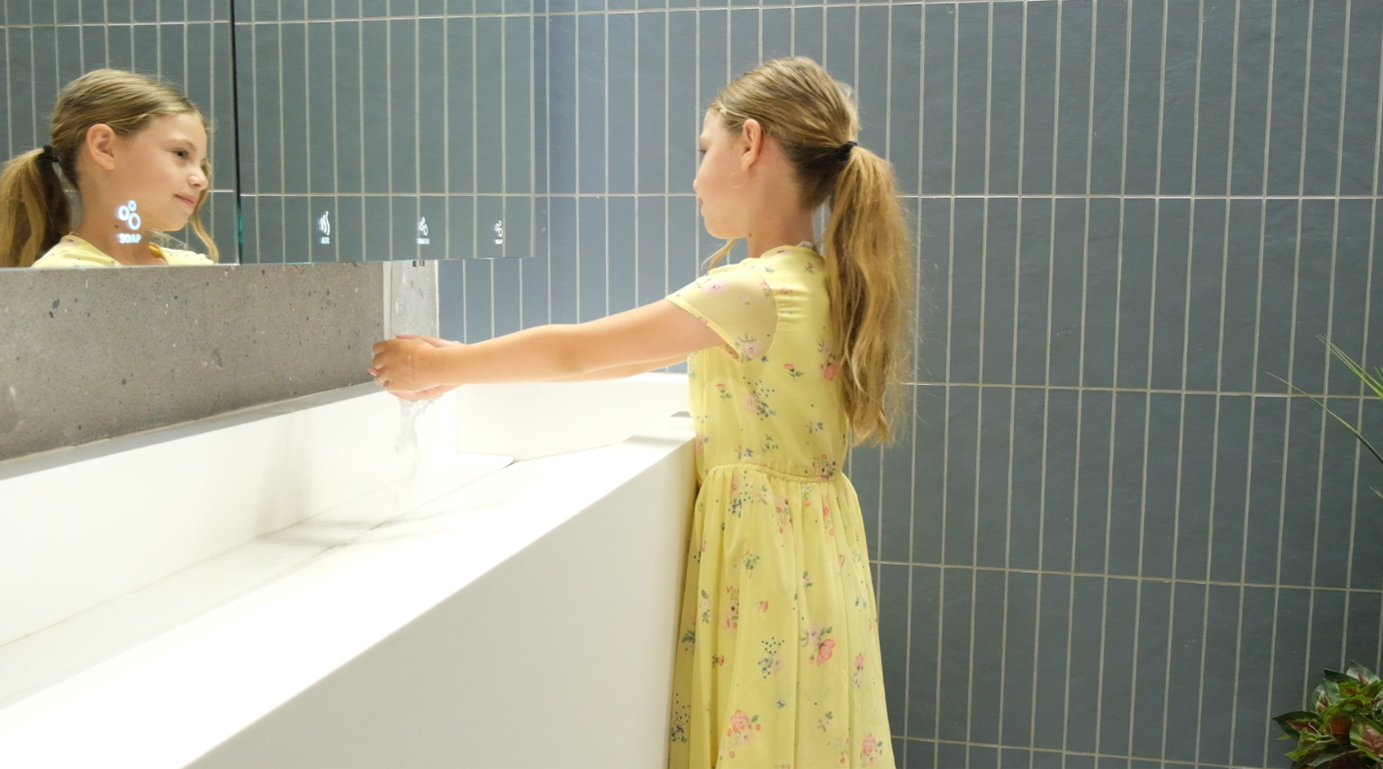 The Concealed Soap Dispenser Experience​ - Girl-using-SWAR