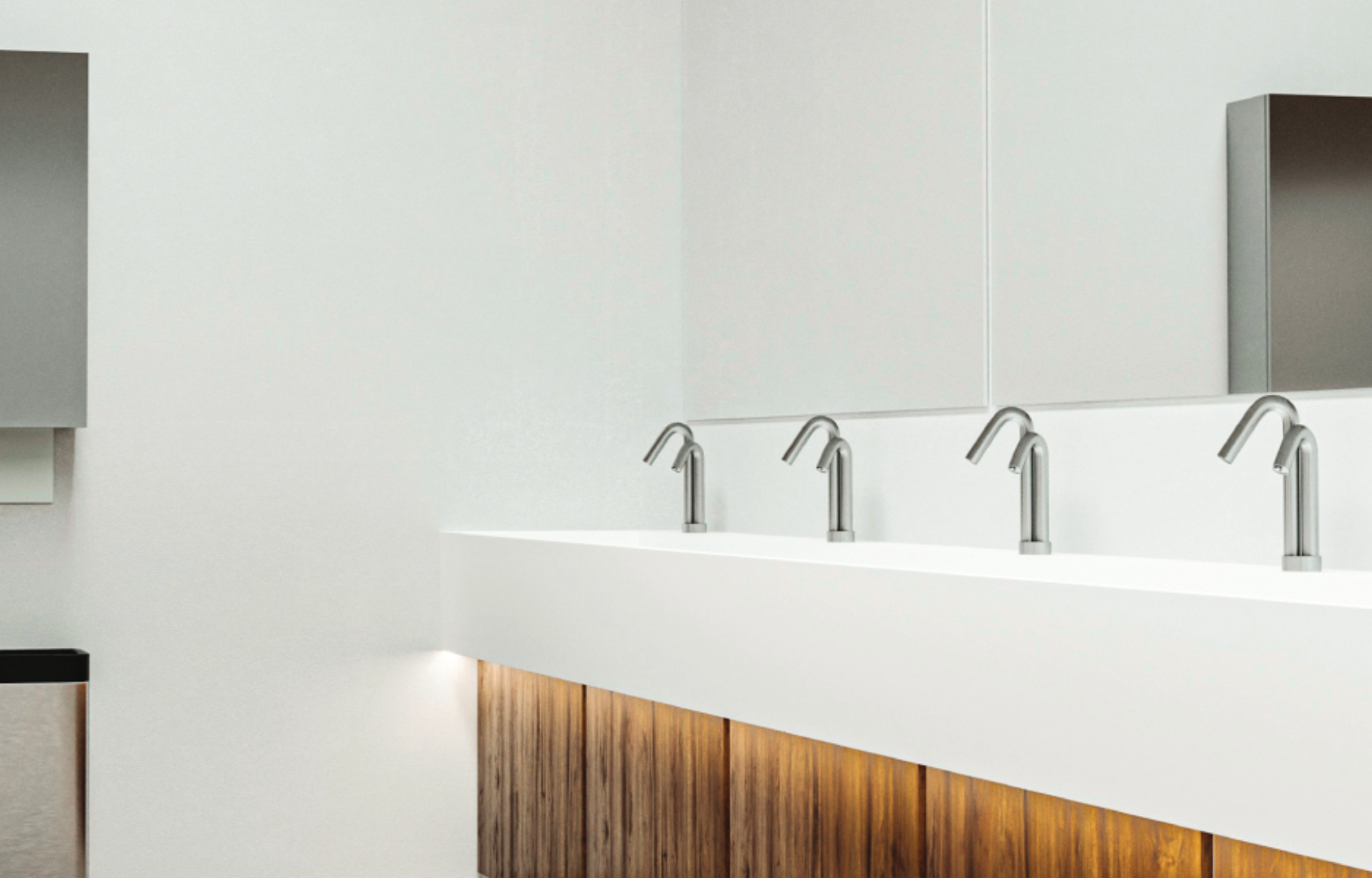 Are there any downsides to using touchless sanitary solutions, such as cost or maintenance issues