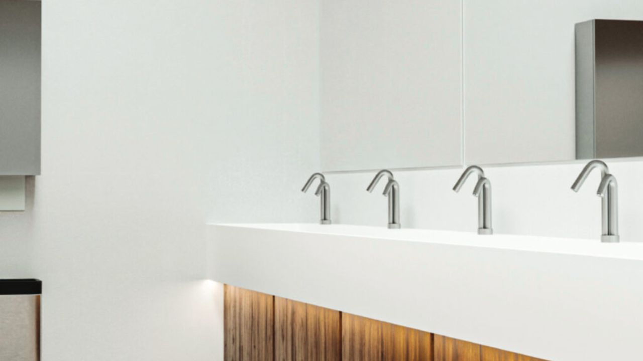 What are touchless sanitary solutions and how do they work?